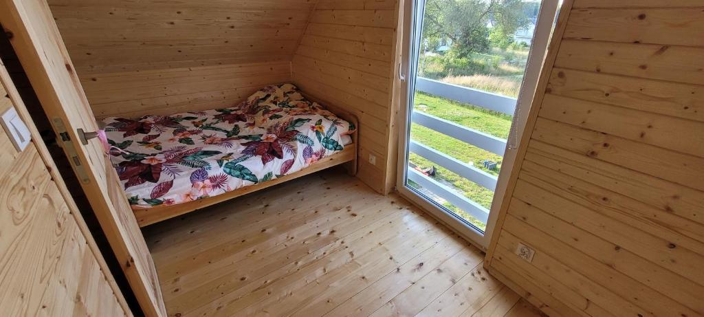 Postel nebo postele na pokoji v ubytování Drewniak
