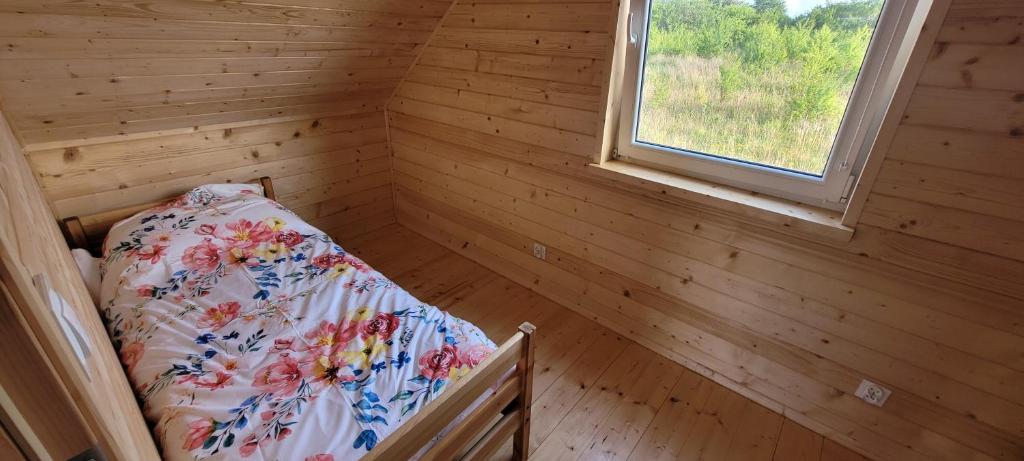 Postel nebo postele na pokoji v ubytování Drewniak