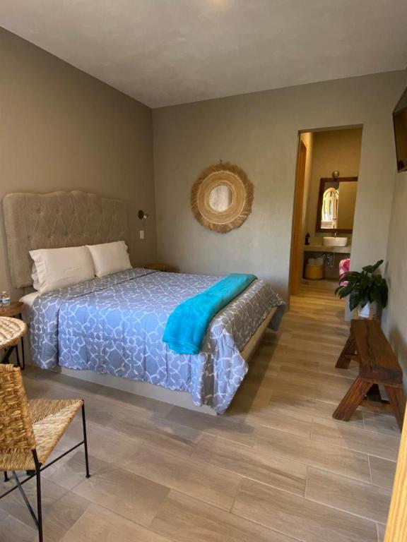 Postel nebo postele na pokoji v ubytování Hotel Casa Caro