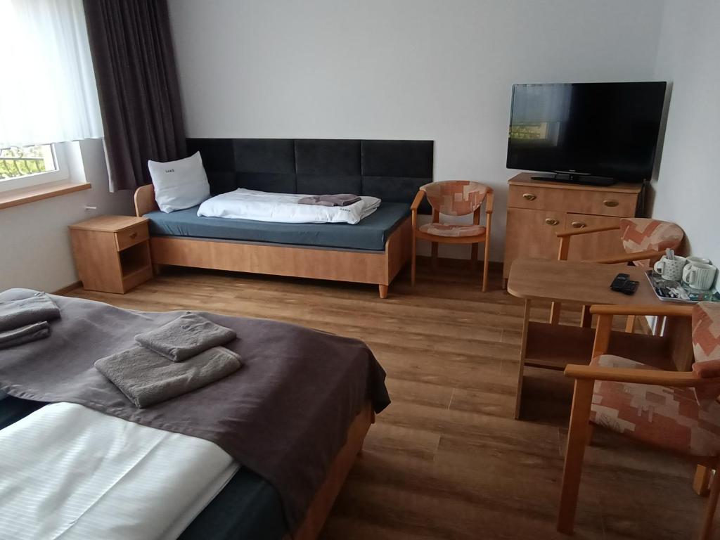 TV a/nebo společenská místnost v ubytování Dom Wczasowy Larix