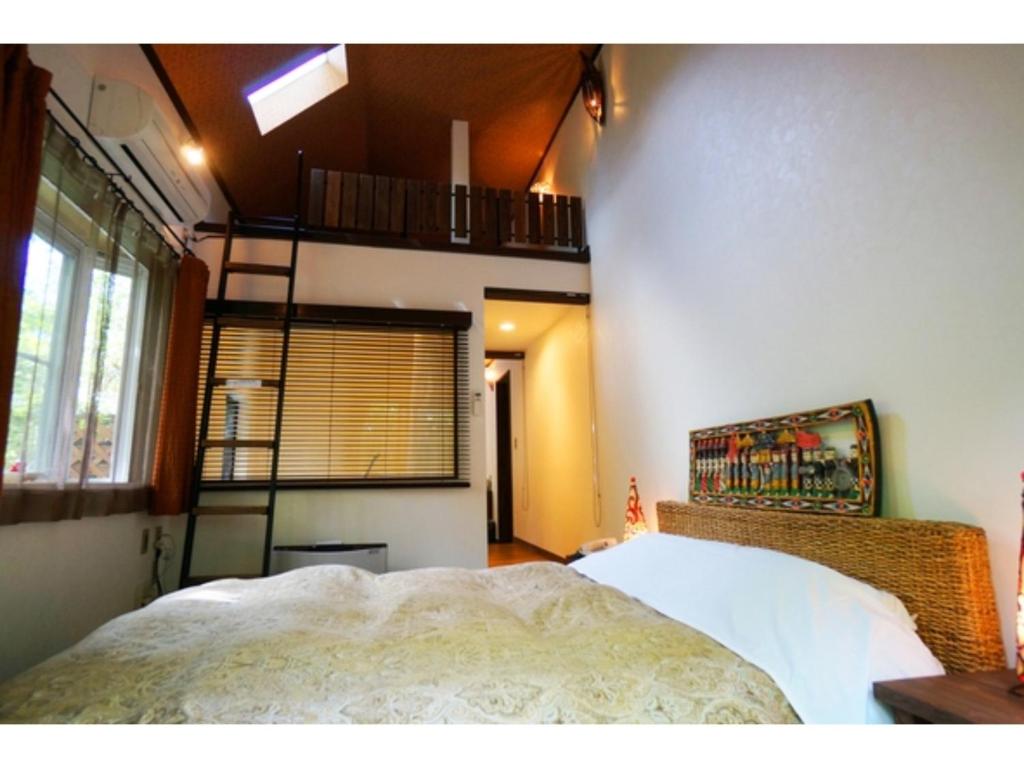 Кровать или кровати в номере Estivant Club - Vacation STAY 95715v