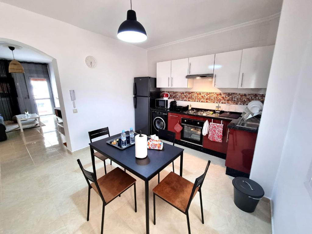 Kuchyň nebo kuchyňský kout v ubytování Prestige Apartment Oued Laou