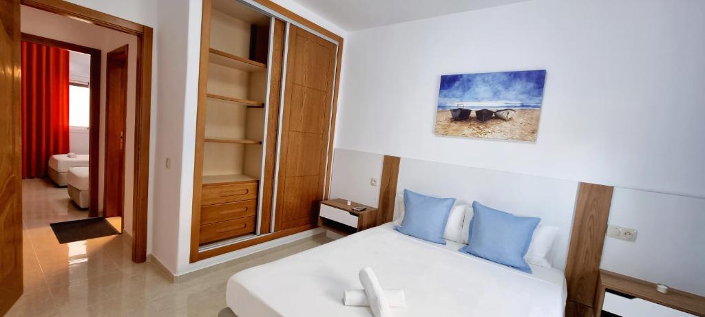 Postel nebo postele na pokoji v ubytování Prestige Apartment Oued Laou