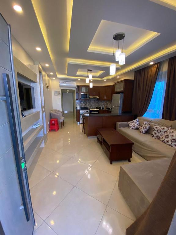 TV a/nebo společenská místnost v ubytování Sharm Hills Aqua park Resort شرم هيلز اكوا بارك ريزورت