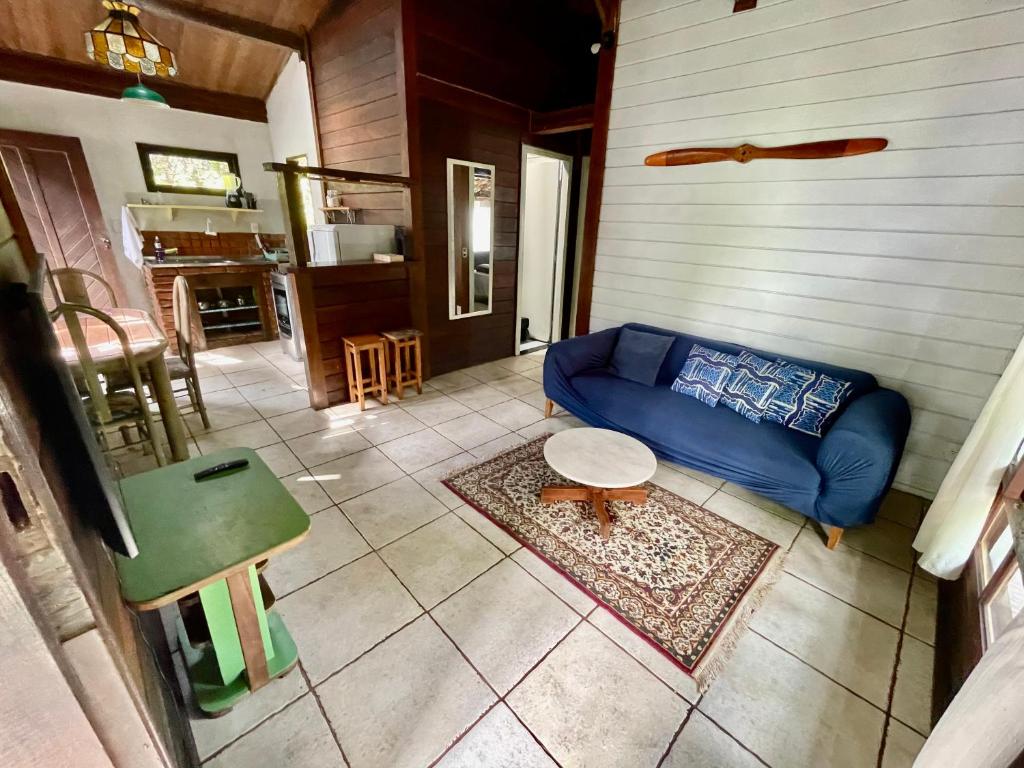 Uma área de estar em Casa Selva - Vila do Abraão - Ilha grande
