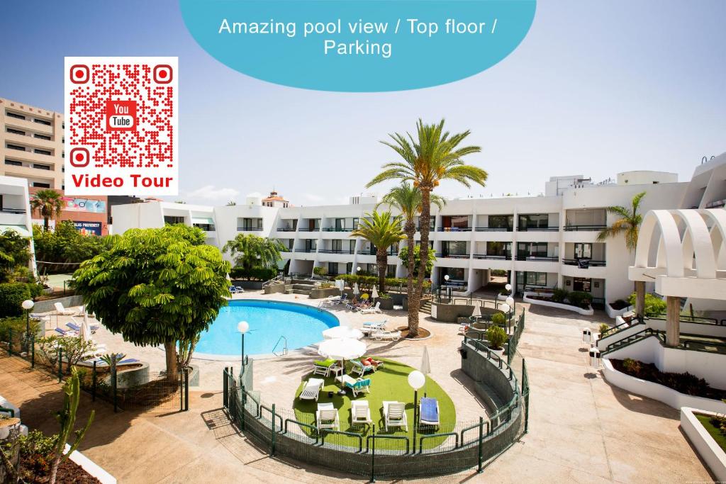 - une vue imprenable sur la piscine dans l'établissement GO2TENERIFE Apart'Teno Amazing pool view & near the beach, à Playa de las Americas