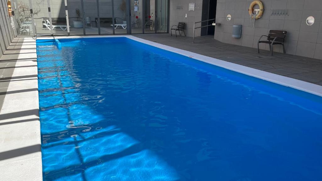Bazén v ubytování Sevilla SantaJusta PG Apartamentos nebo v jeho okolí