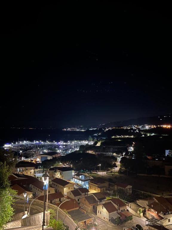 a view of a city at night with lights at Nereide in Tropea