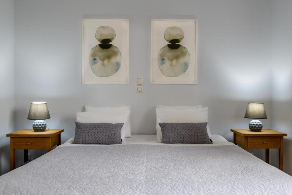 Postel nebo postele na pokoji v ubytování Olympus Pantheon Luxury Villas