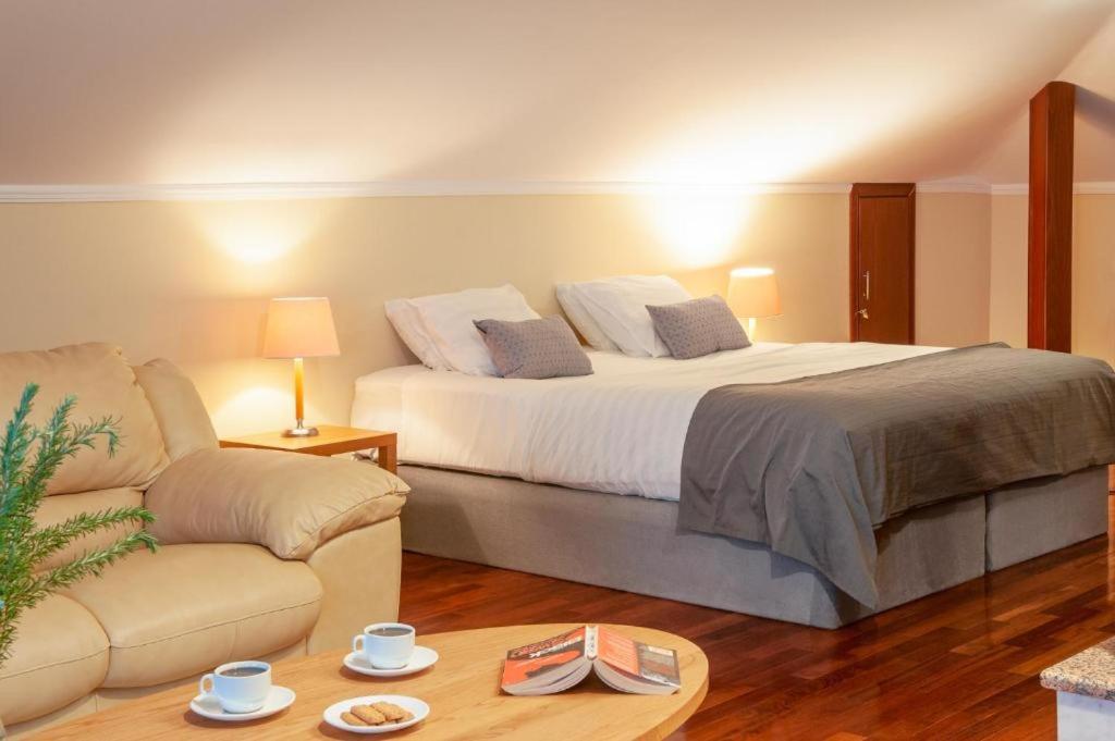 Postel nebo postele na pokoji v ubytování Olympus Pantheon Luxury Villas