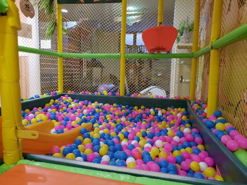 a ball pit filled with lots of balls at Polidor Glamping Resort in Poreč