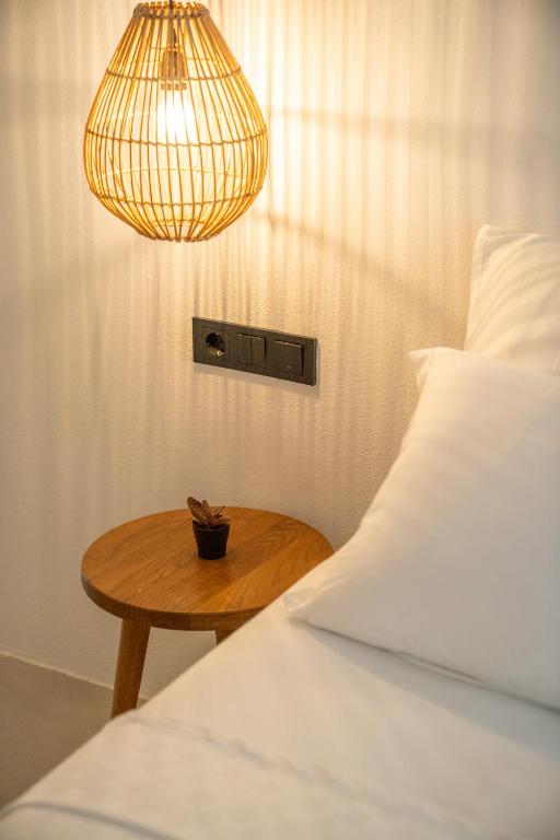 Postel nebo postele na pokoji v ubytování Gizz Suites