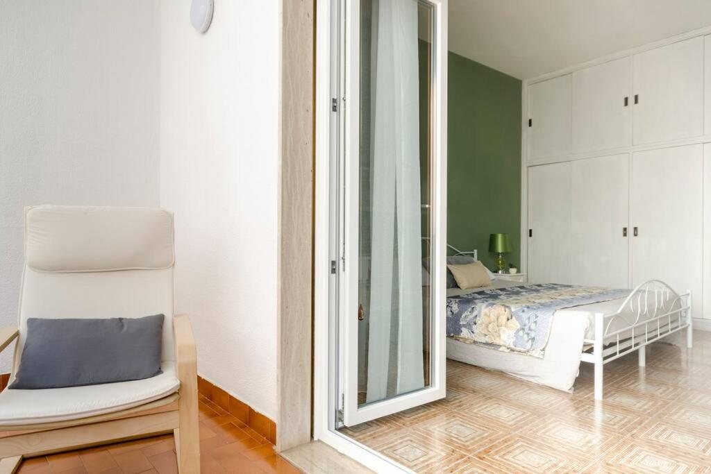 Postel nebo postele na pokoji v ubytování Casa Mariù