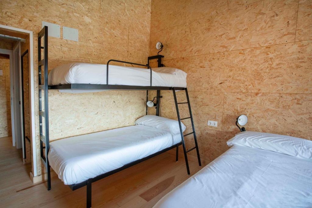 Postel nebo postele na pokoji v ubytování Paorra Baserria