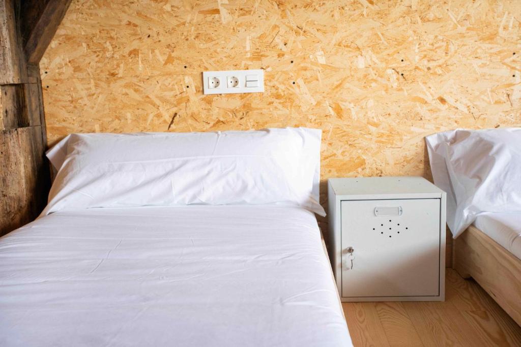 Postel nebo postele na pokoji v ubytování Paorra Baserria