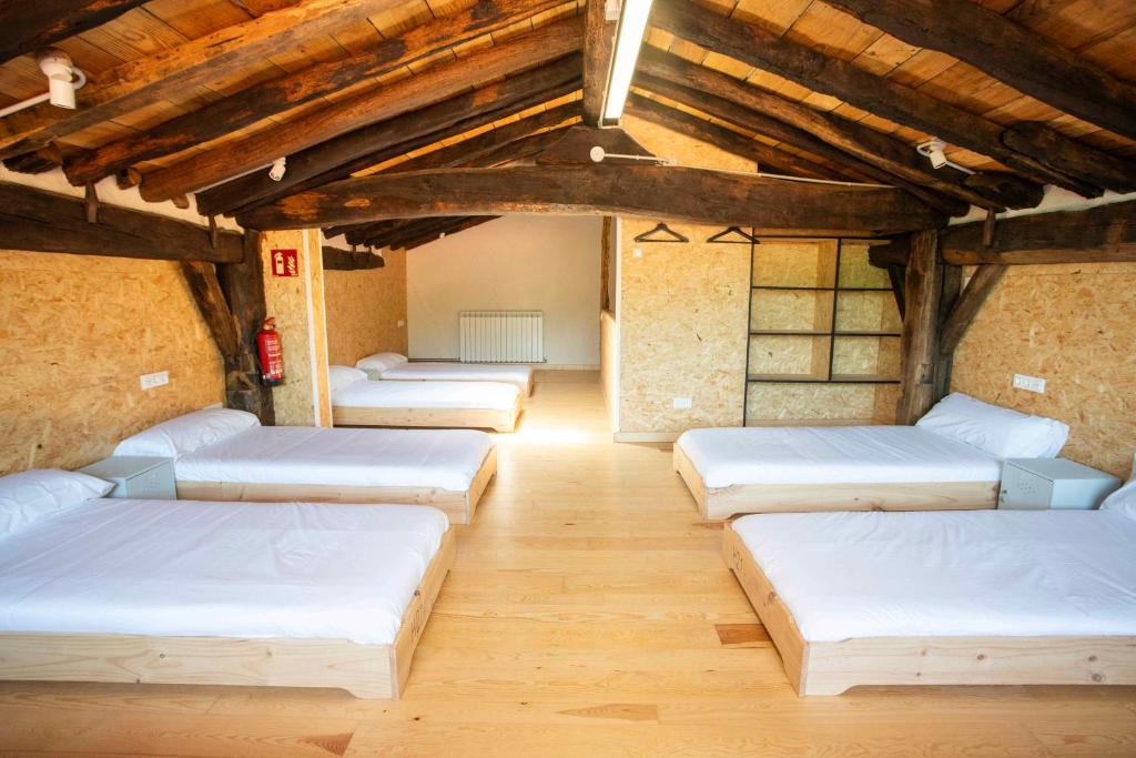 Postel nebo postele na pokoji v ubytování Paorra Baserria