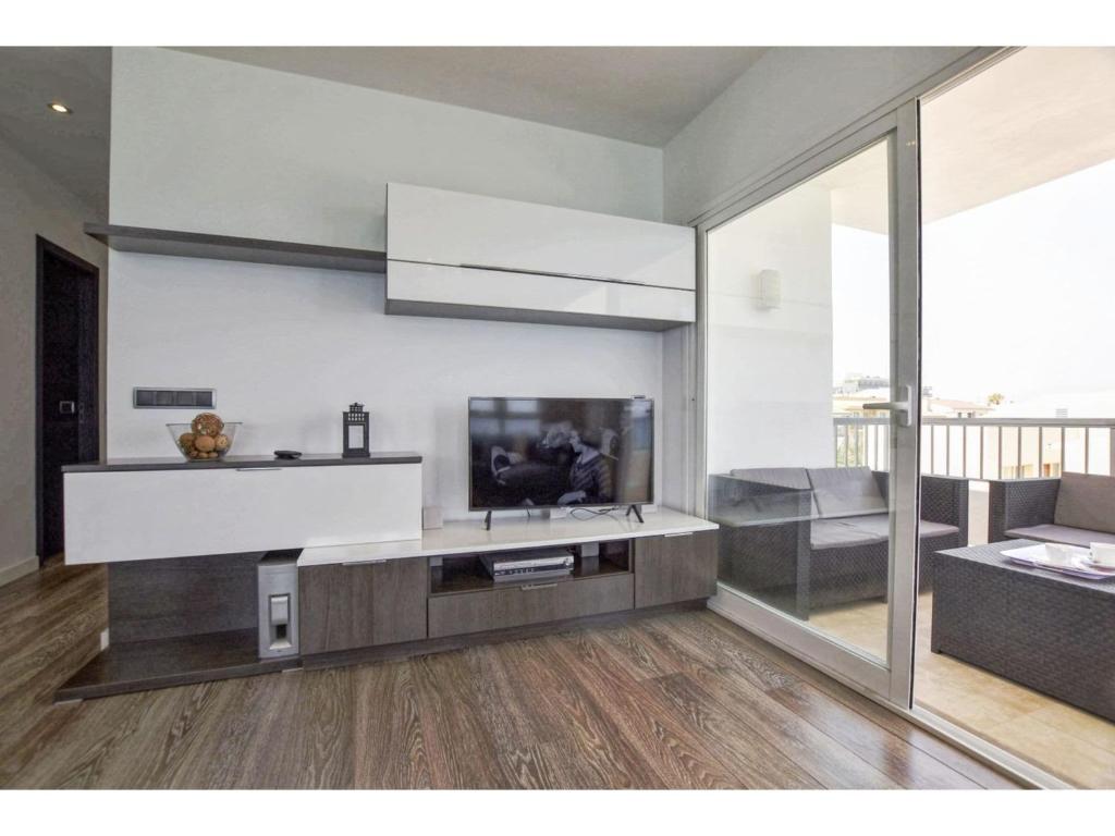 A television and/or entertainment centre at Belvilla by OYO Son Baulo