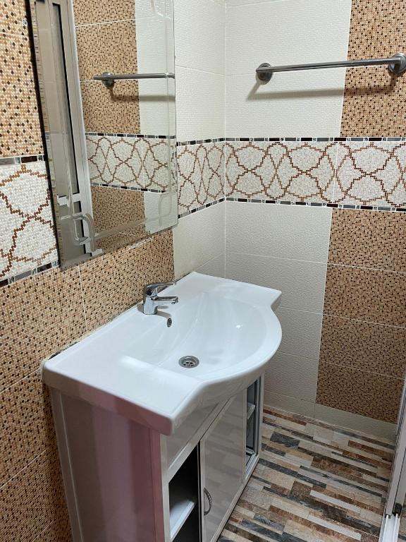 Koupelna v ubytování Shrif Appart-Luxe
