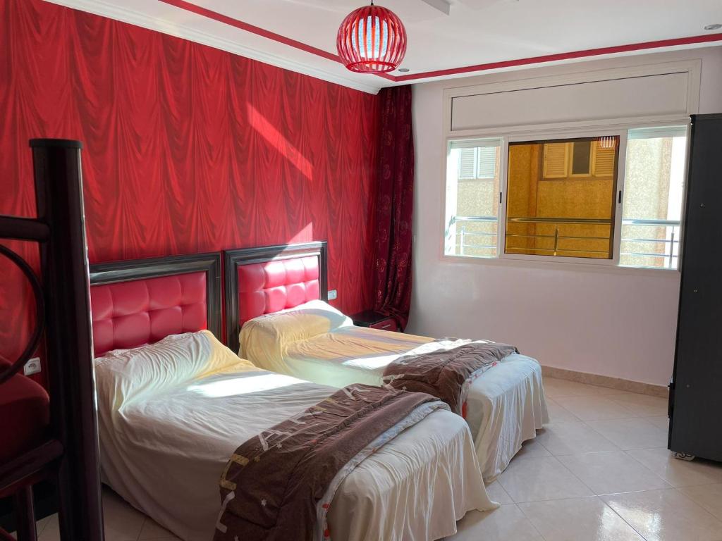 Postel nebo postele na pokoji v ubytování Shrif Appart-Luxe