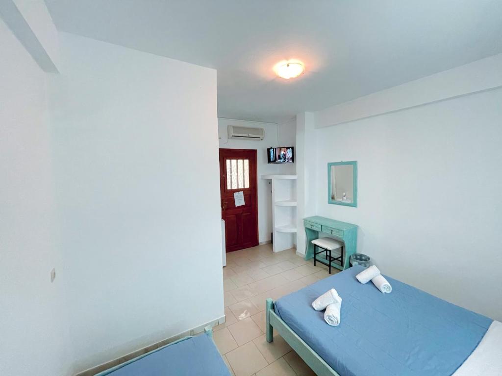 Una cama o camas en una habitación de Villa Dima