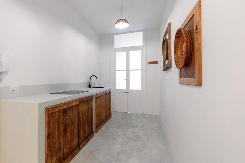 Cucina o angolo cottura di Crobi Museum and Suites