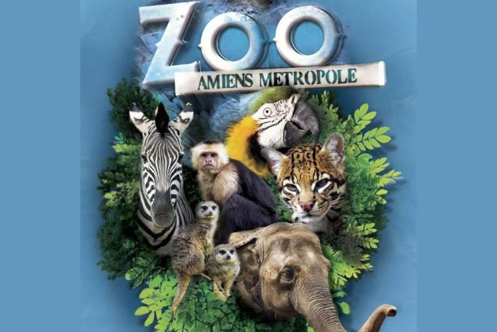 a zoo book with a picture of animals andotics at Appartement neuf entièrement équipé proche centre in Amiens
