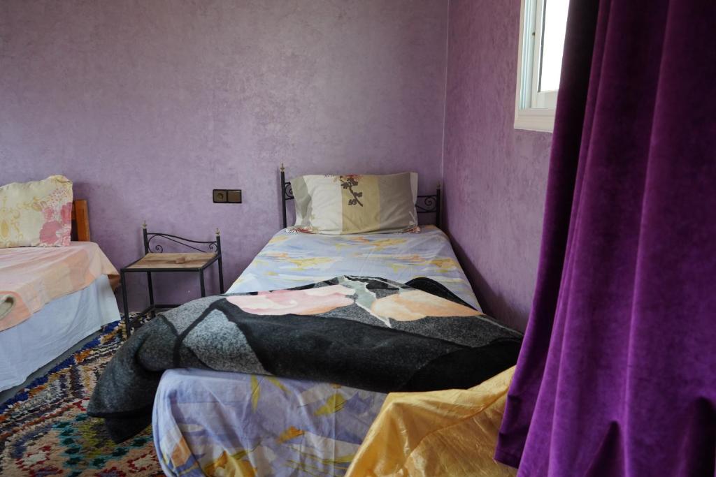Postel nebo postele na pokoji v ubytování Chez Imnir