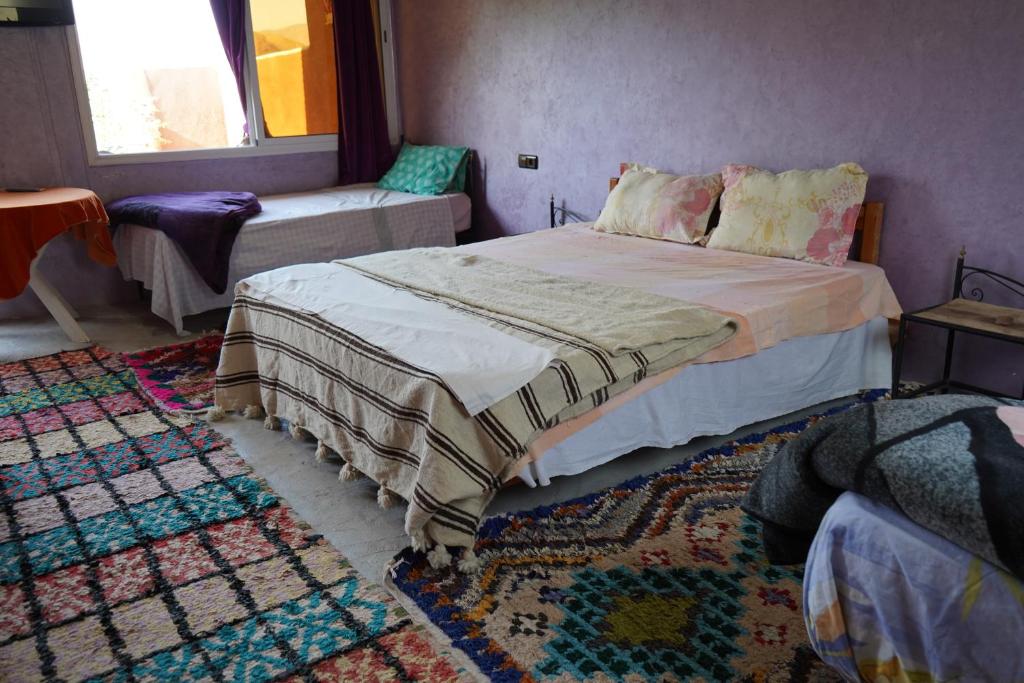 Postel nebo postele na pokoji v ubytování Chez Imnir