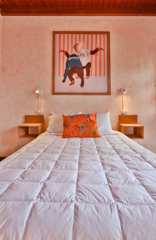Postel nebo postele na pokoji v ubytování Macarena Hostel