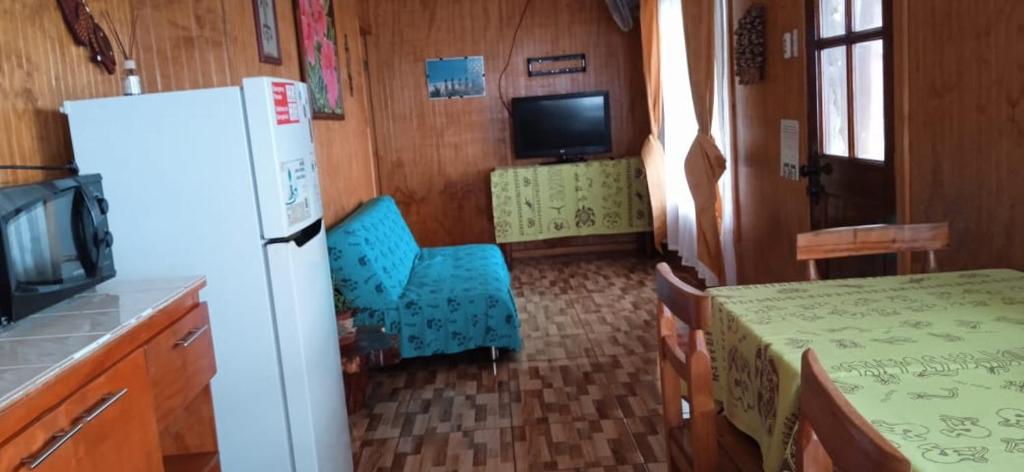 Cucina o angolo cottura di Cabañas & Hostal Tojika