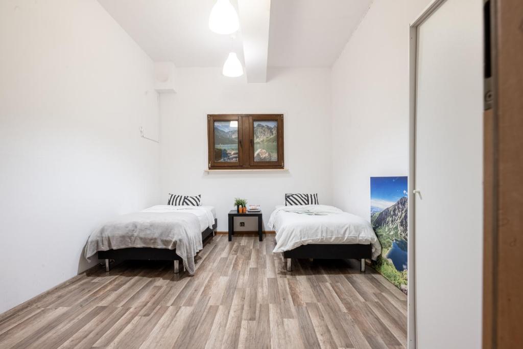 Posteľ alebo postele v izbe v ubytovaní Target Hostel
