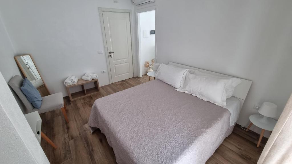 Postel nebo postele na pokoji v ubytování Casa Apula