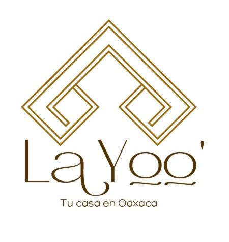 a logo for a yoga class in oaxaca at Layoo, Tu casa en Oaxaca 102 in Oaxaca City