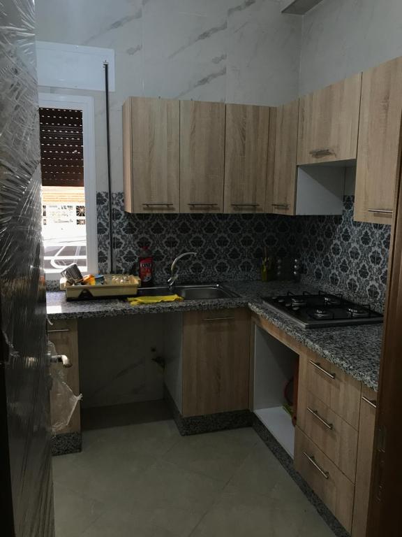 Kuchyň nebo kuchyňský kout v ubytování Spacious 2-rooms apartment