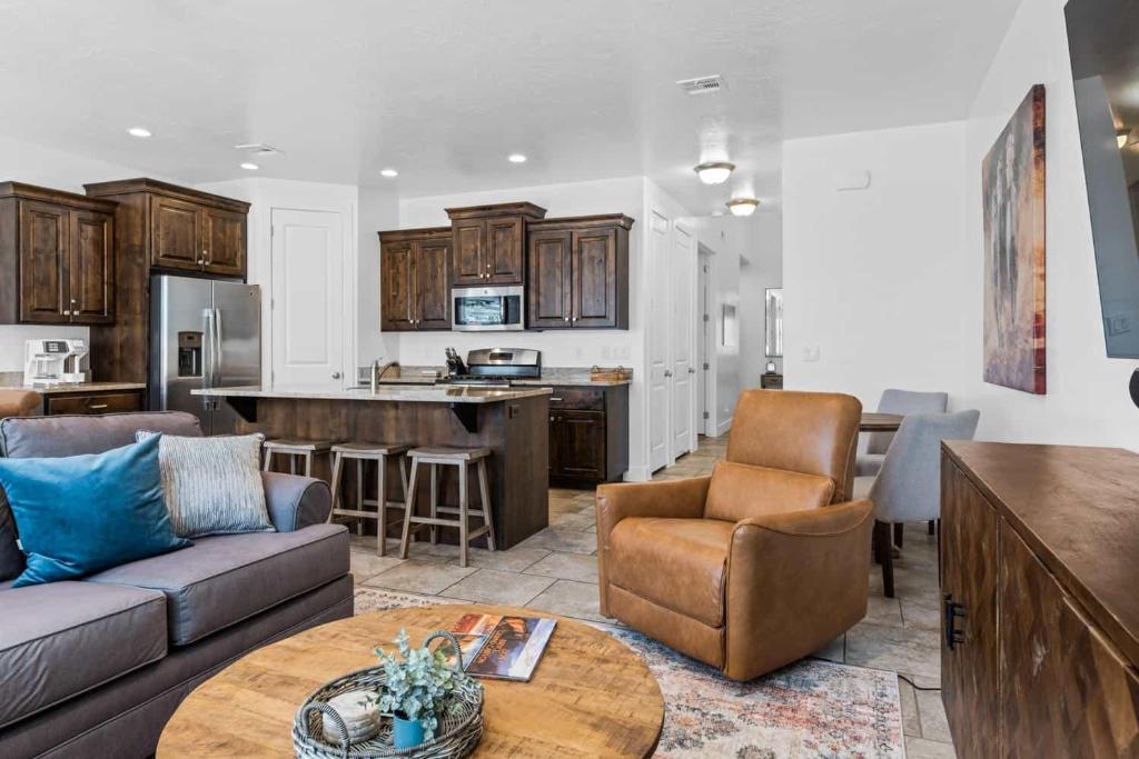 a living room with a couch and a table at Narrow's Gateway townhouse in Washington