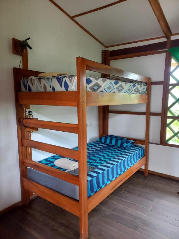 Postel nebo postele na pokoji v ubytování Pagalù Hostel