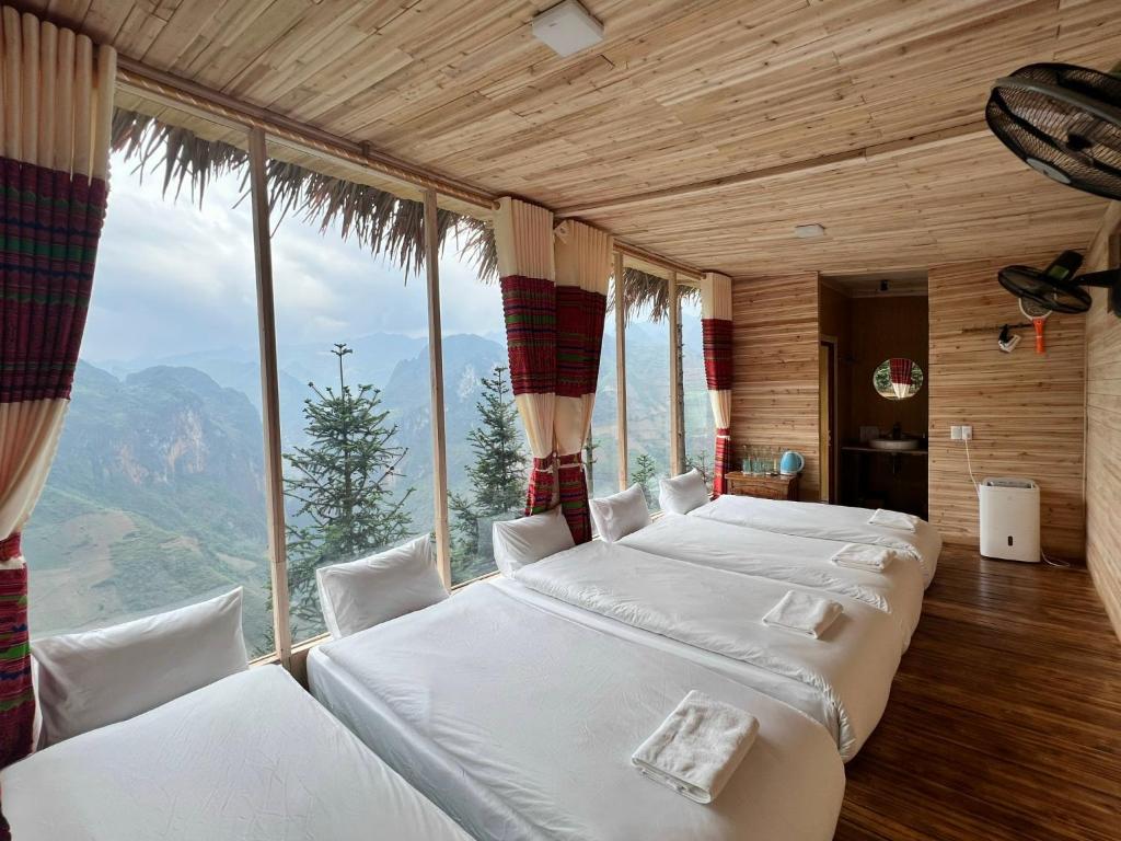 Postel nebo postele na pokoji v ubytování Ma Pi Leng EcoLodge