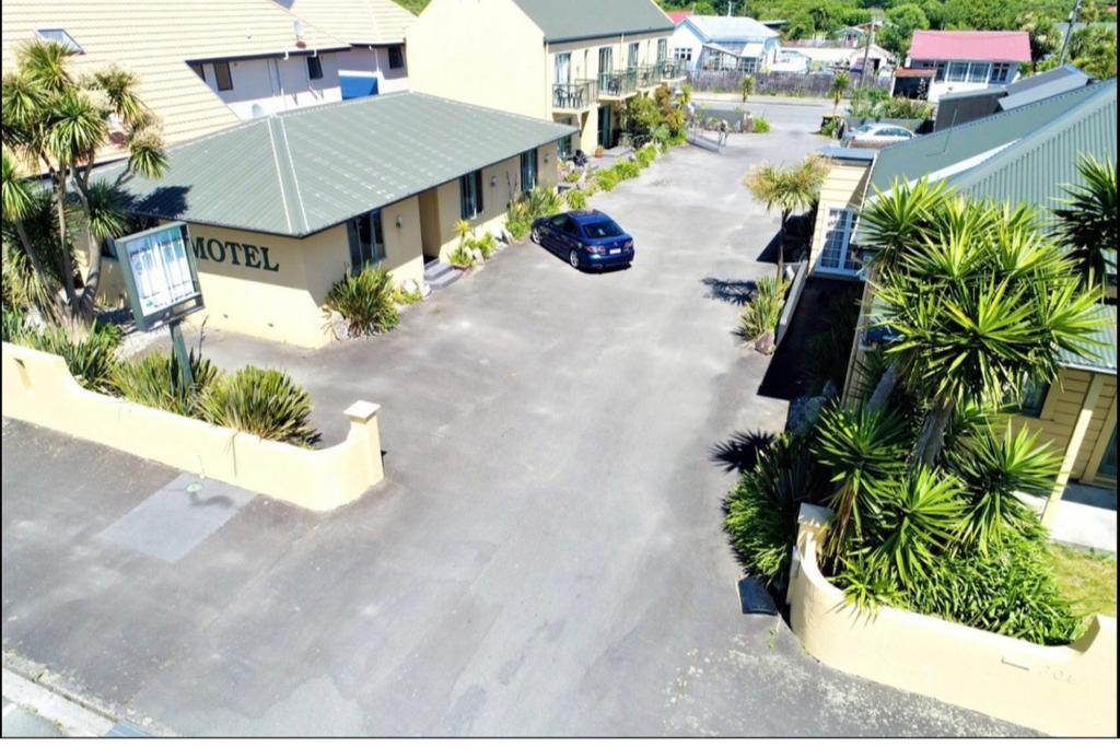 an aerial view of a parking lot at a motel at Palmcourt Motel in Westport