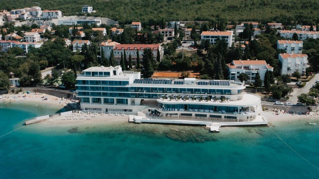 an aerial view of a large cruise ship on a beach at Luxury Hotel Amabilis in Selce