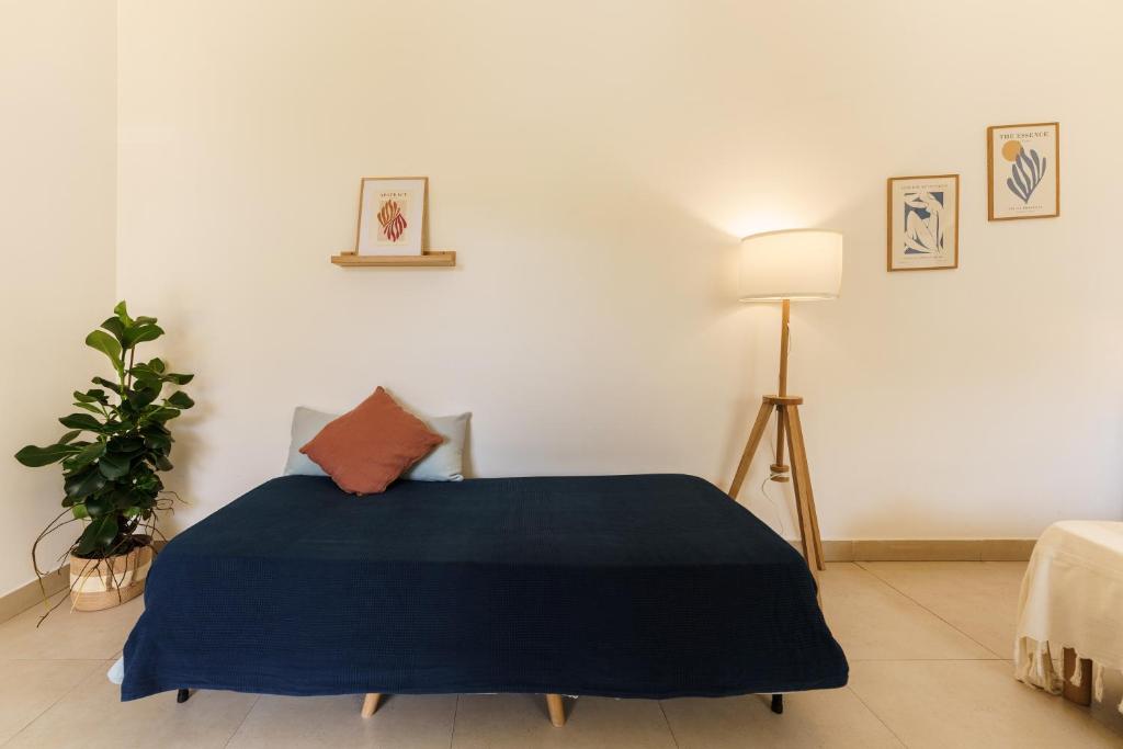 Postel nebo postele na pokoji v ubytování Villa Mazzella