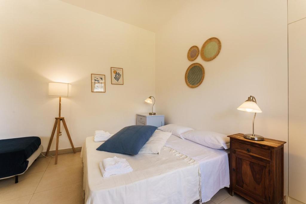 Postel nebo postele na pokoji v ubytování Villa Mazzella