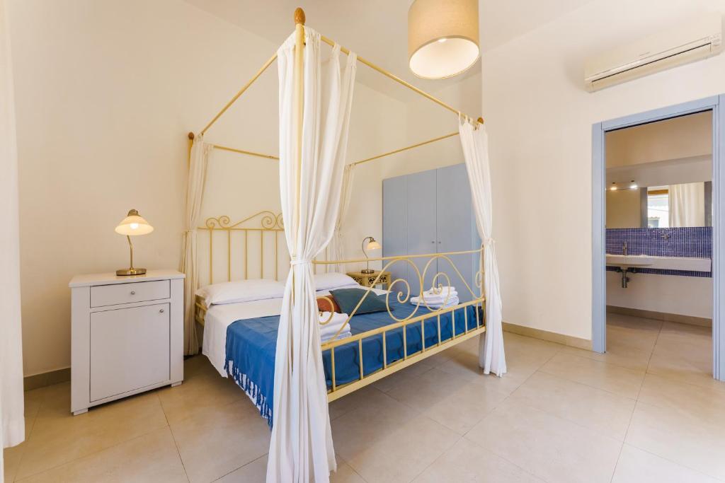 Postel nebo postele na pokoji v ubytování Villa Mazzella