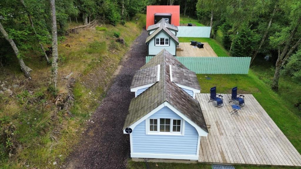 an overhead view of a house on a hill at 1Lochness glam lodges in Inverness