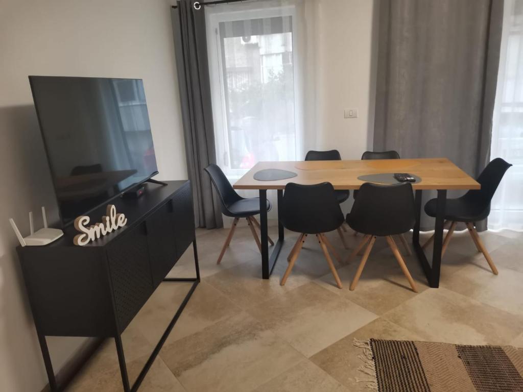 TV a/nebo společenská místnost v ubytování THE NOOK APARTHOTEL