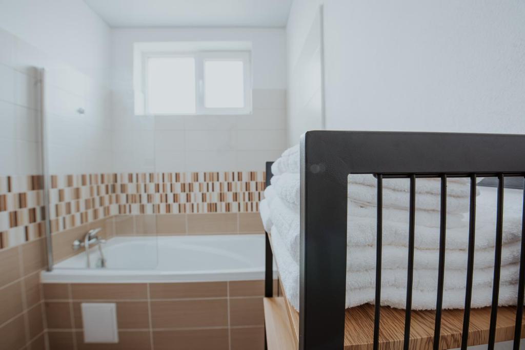 Postel nebo postele na pokoji v ubytování THE NOOK APARTHOTEL