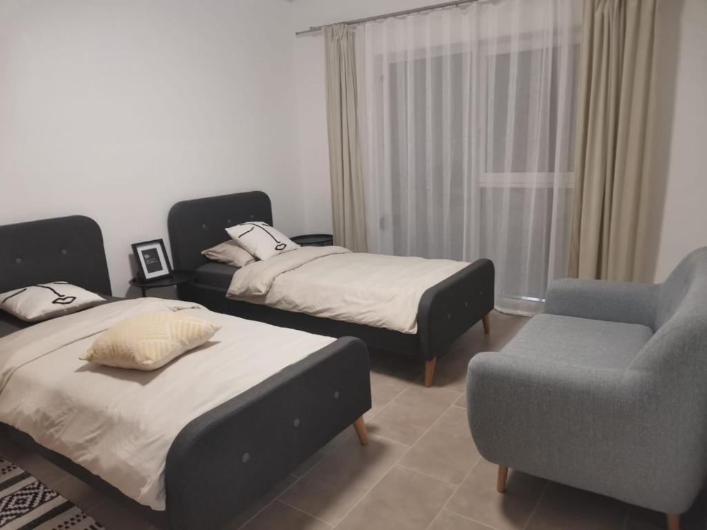 Postel nebo postele na pokoji v ubytování THE NOOK APARTHOTEL