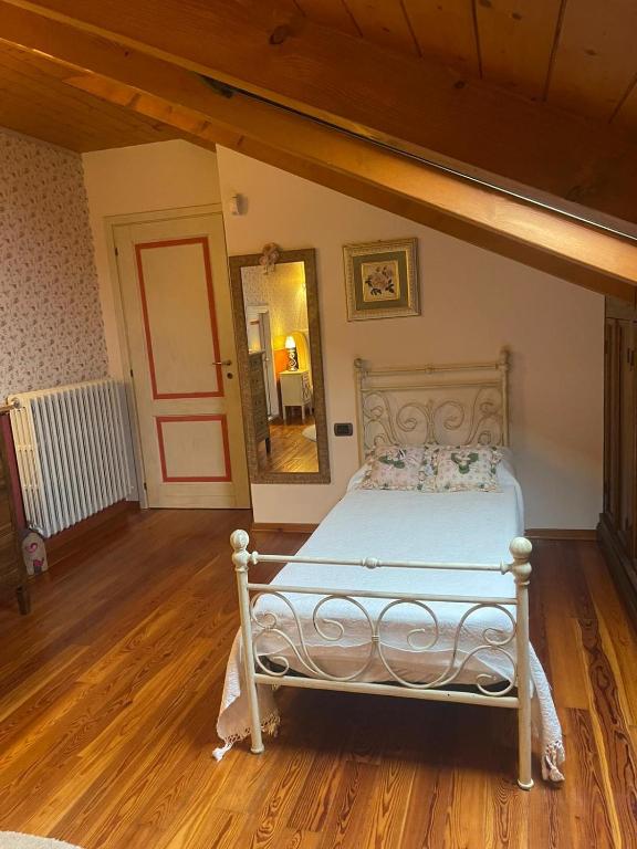 A bed or beds in a room at B&B La Bianchina