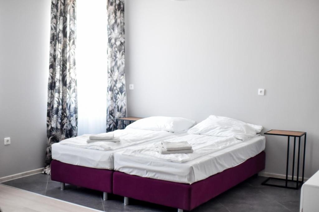 Postel nebo postele na pokoji v ubytování Jarzębinowy Resort & SPA