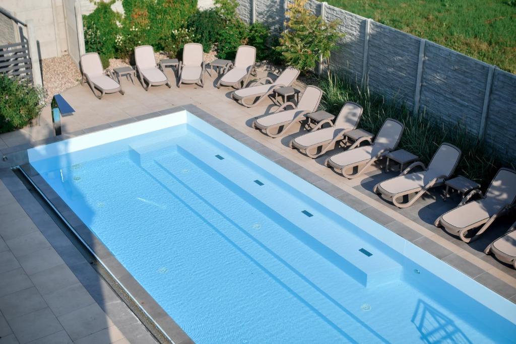 Bazén v ubytování Jarzębinowy Resort & SPA nebo v jeho okolí