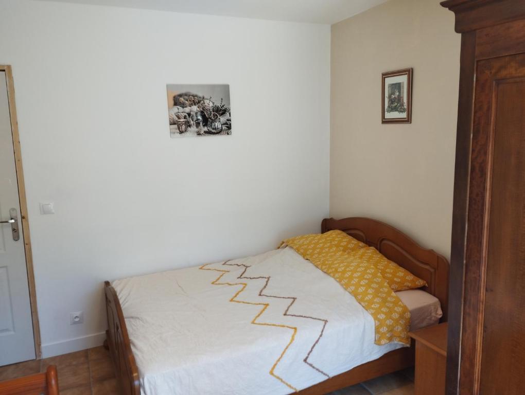 Posteľ alebo postele v izbe v ubytovaní Gîtes "La Sérénité Marivaloise"